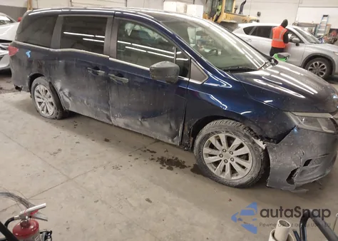 2018 Honda Odyssey Lx z USA, uszkodzony, nr VIN 5FNRL6H27JB088443